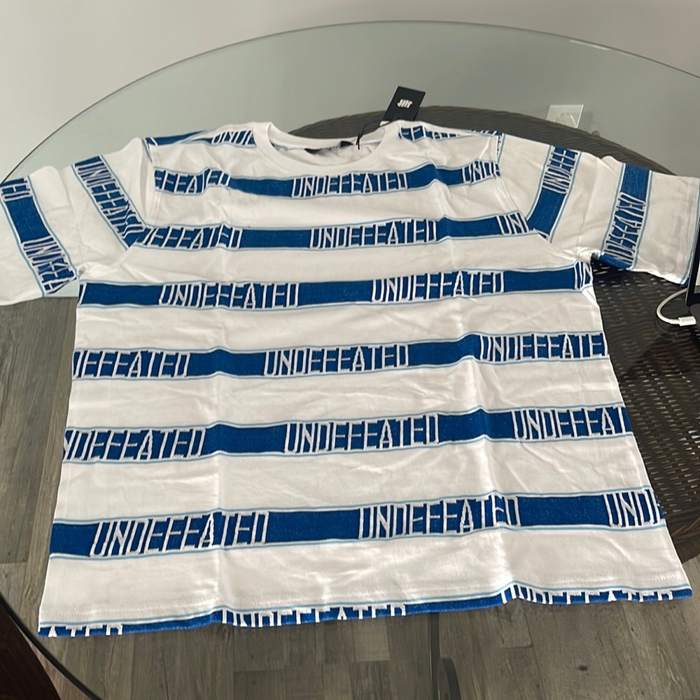 Undefeated white and blue tee shirt Size L